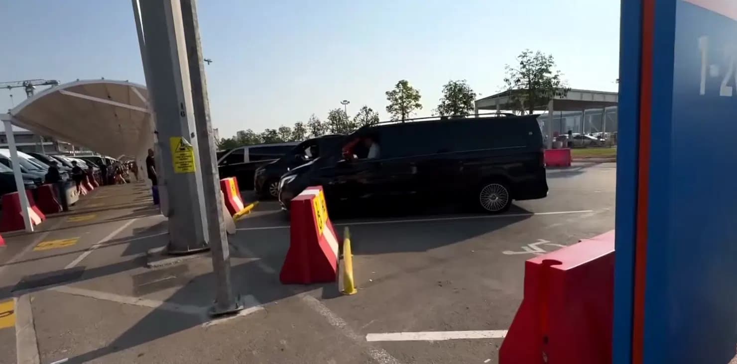 Private transfer vans waiting outside Antalya airport