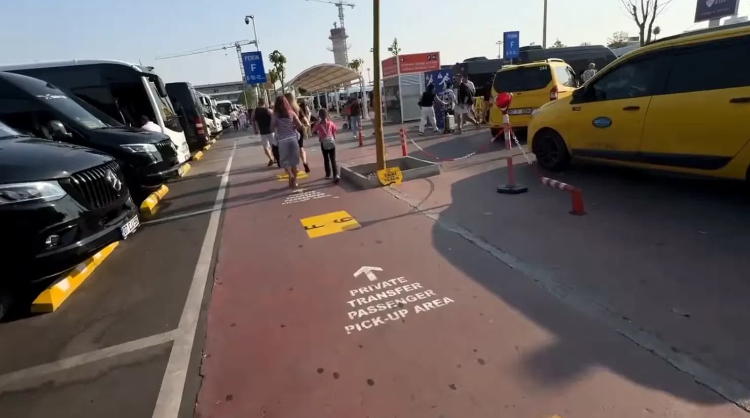 Marked private transfer passenger pick-up pedestrian walkway