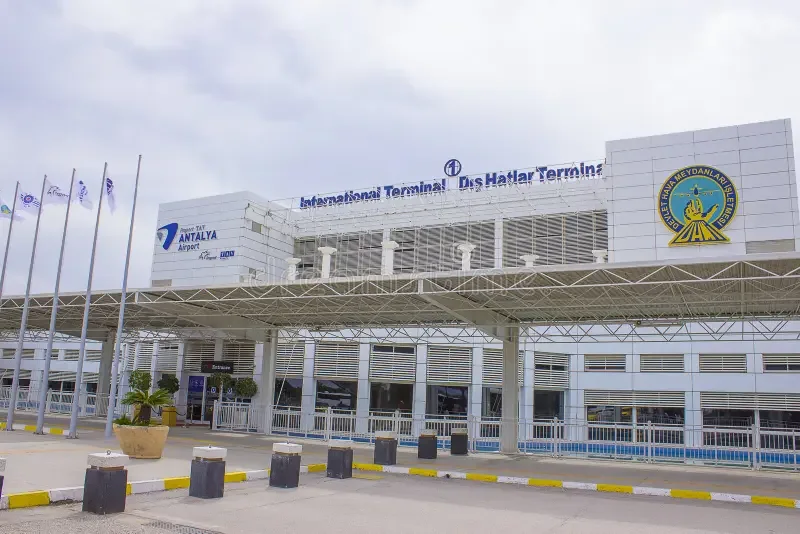 Actual airport exterior photo provided for Antalya Terminal 1