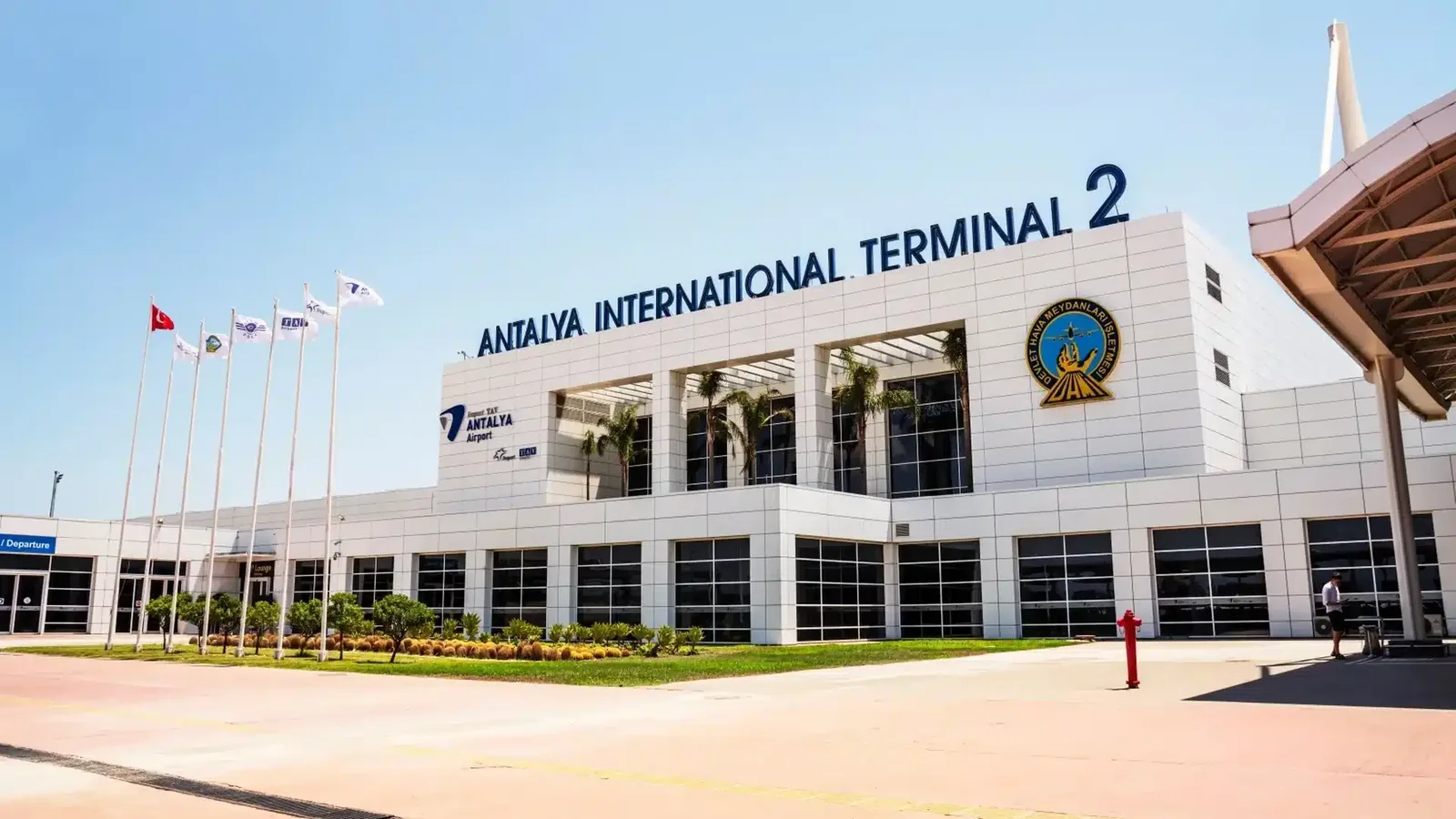 Actual airport exterior photo provided for Antalya Terminal 2